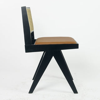 Leatherette seat with subtle stitching and rounded wood corners.