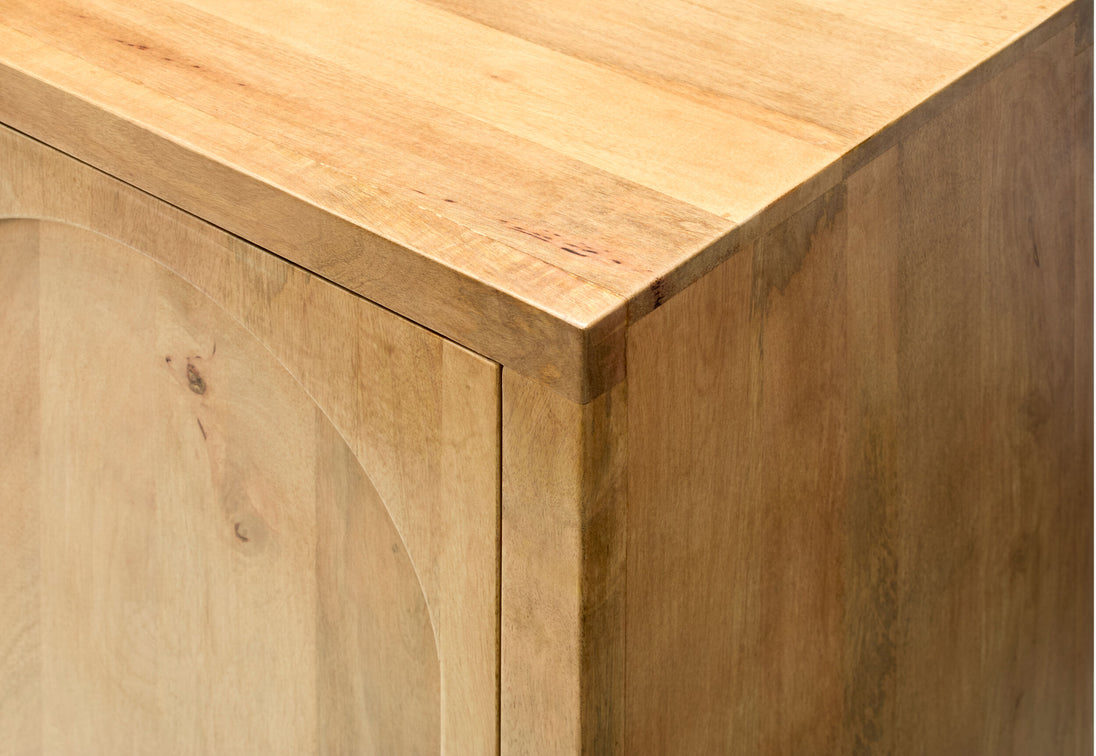 Front view of the Byron Cabinet showing minimalist mango wood doors and refined profile.