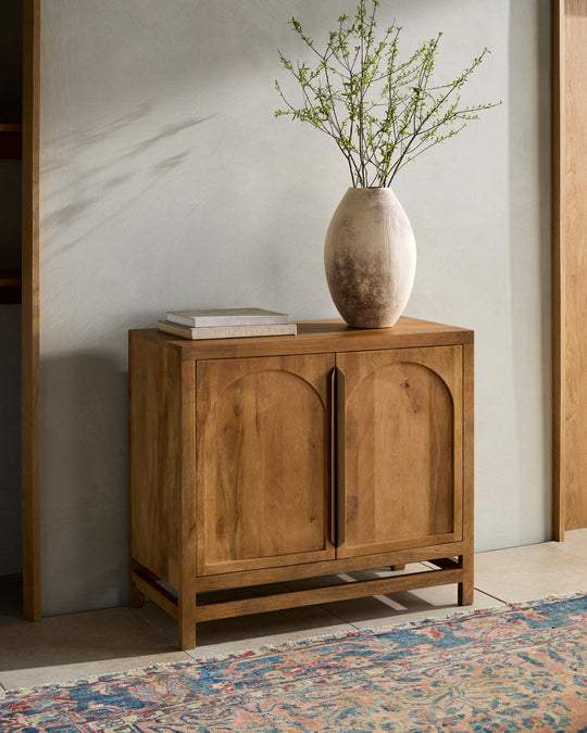 Byron Cabinet styled in a minimalist living room with warm, organic tones.