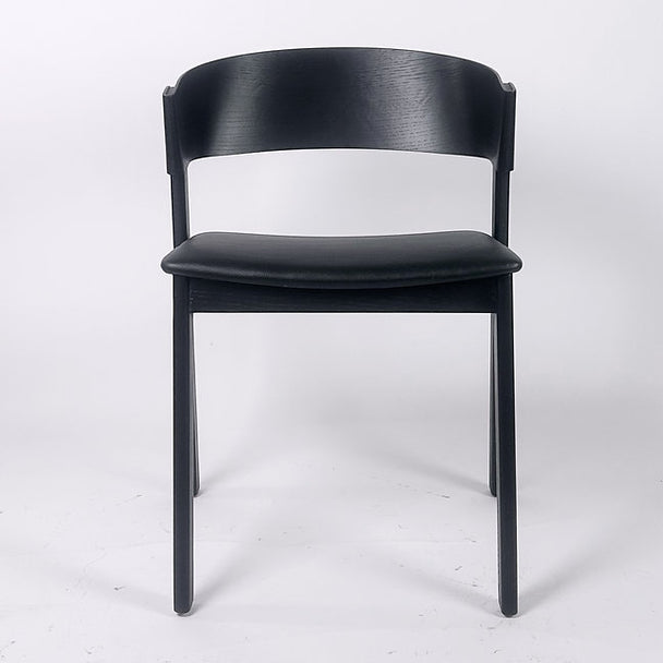 Thomas Side Chair in black plywood finish with leatherette seat cushion.