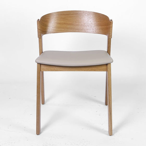 Thomas Side Chair in natural woodgrain finish with PU leather seat.